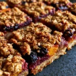 Blueberry Peach Crumble Bars with Buttery Oat Topping
