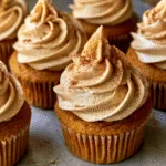 Irresistible Pumpkin Cupcakes Topped with Creamy Cinnamon Frosting!